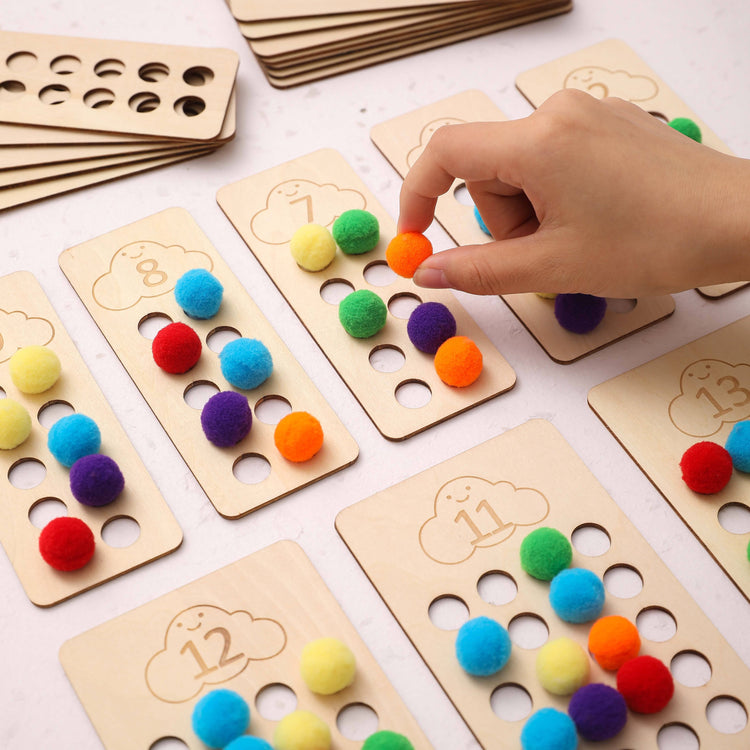 Holzspiele Montessori